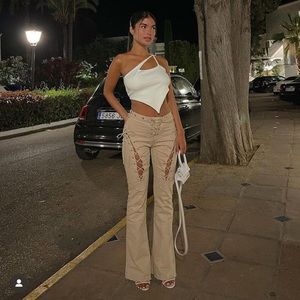 Beige Mirami pants by the kript. No longer available on the site. 100% cotton.